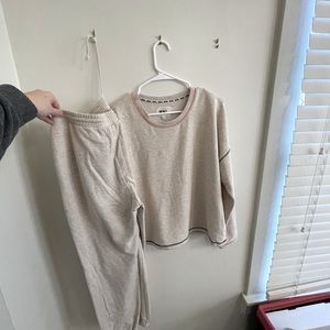 Madewell MWL sweatsuit with navy/pink stitching.